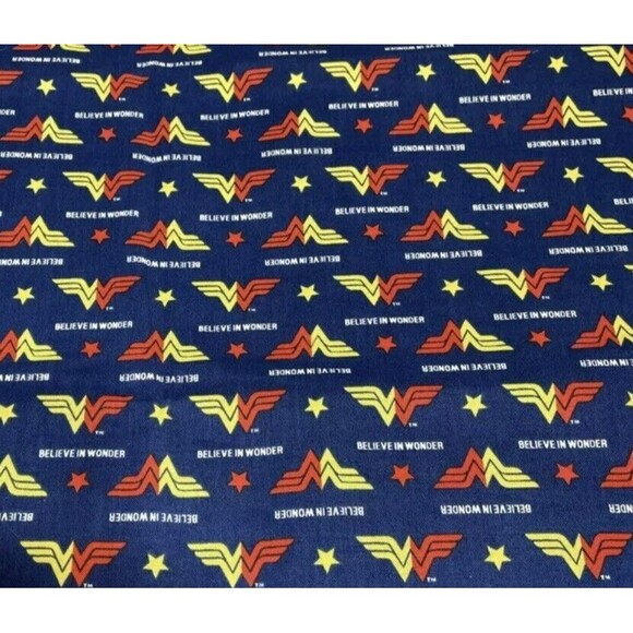 New Wonder Woman Fabric Warner Bros. Blue Background Cotton By the Yard - Picture 1 of 3